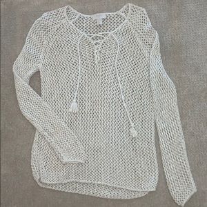 Open hole sweater